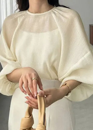 Well Tailored Top with a Graceful Silhouette