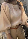 A Vintage Style Blouse with Delicate Timeless Details