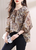 Well Tailored Top with a Graceful Silhouette