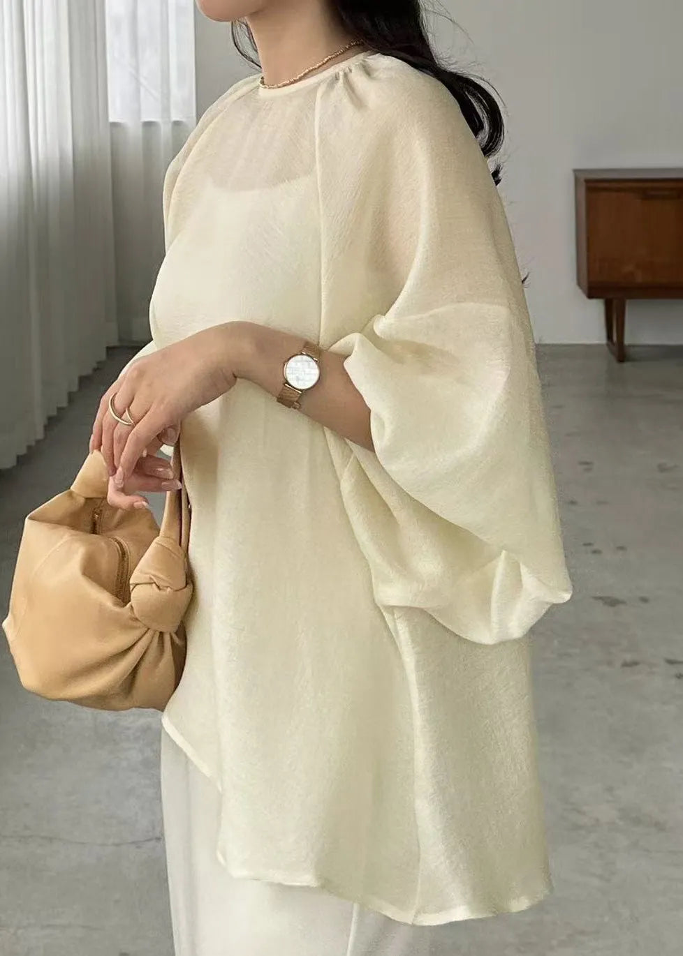 Well Tailored Top with a Graceful Silhouette